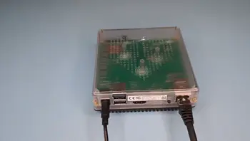 Image showing the Home Assistant Green with a yellow heartbeat